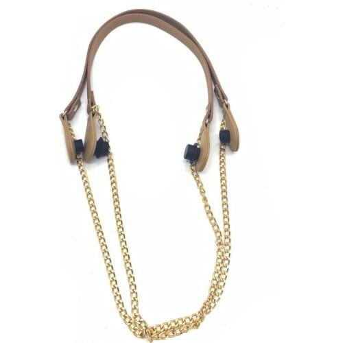 Brown shoulder bag handles accessary