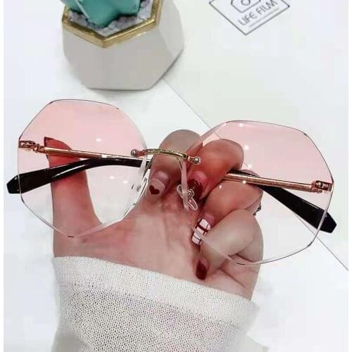 New metal rimless sunglasses Europe and The United States trend glasses cut edge sunglasses polygonal womens sunglasses