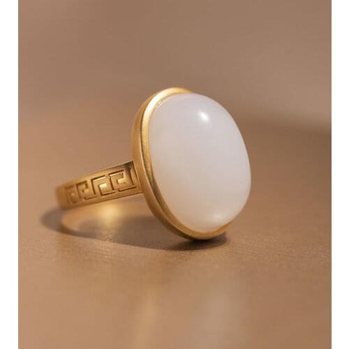 Natural south red tourmaline Chinese retro palace style hollowed out egg surface elegant charm womens silver jewelry