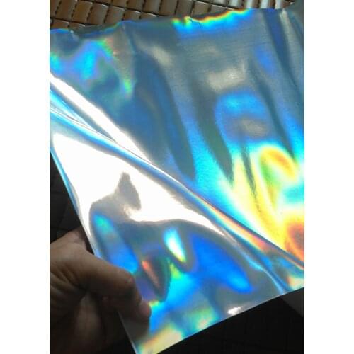 Silver Holographic Laser Leather Fabric,Shiny PU Leather ,Wallets,Headwear Holographic Leather.Sold By 5 Yard per lot
