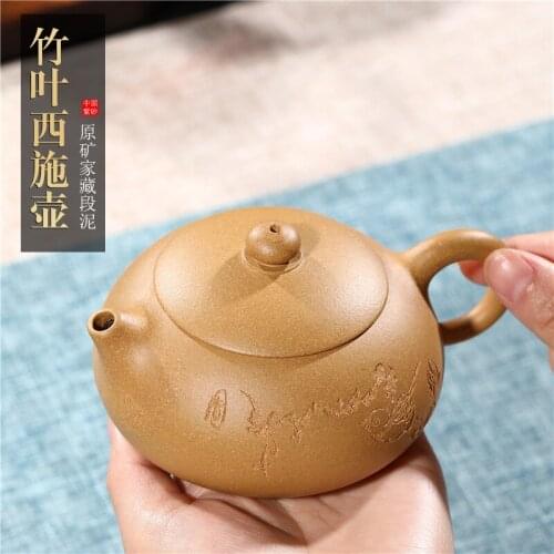 Sales Yixing hand lettering purple clay pot golden section of clay Xishi pot shop agent one on behalf of delivery