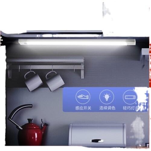 Wardrobe with elongated sensor light wave sweep hand shoe cabinet light chopping kitchen stove light led strip