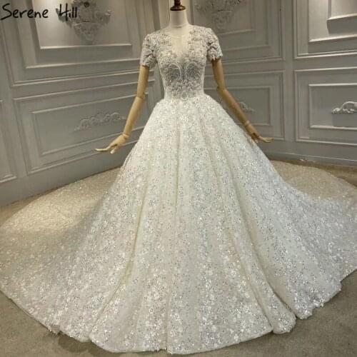 Dubai Ivory Short Sleeves Sexy Wedding Dresses 2020 Bling Beading Diamond Luxury Bridal Gowns HA2408 Custom Made