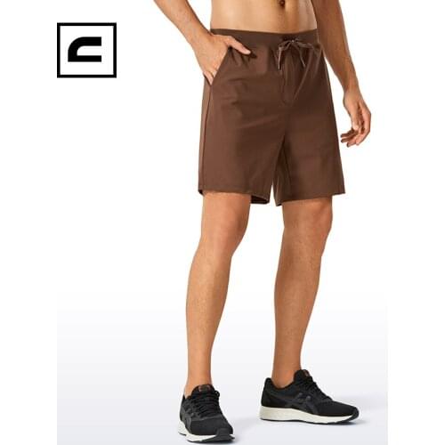 CRZ YOGA Mens Stretch Workout Shorts Lightweight Running Gym Athletic Shorts with Pockets - 7 Inches