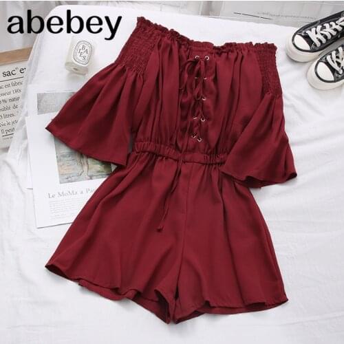 2021 New Summer Fashionable All-match off shoulder Slash neck Jumpsuits flared sleeve lace up waist slim fit wide leg Jumpsuits