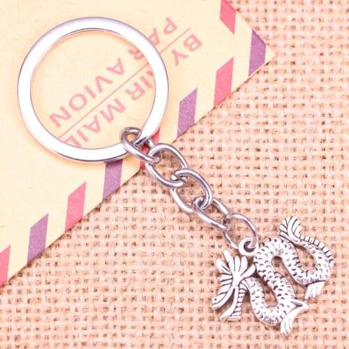 20pcs New Fashion Keychain 23x17mm dragon loong Pendants DIY Men Jewelry Car Key Chain Ring Holder Souvenir For Gift