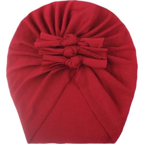 2021 autumn and winter new childrens bow hats newborn soft and comfortable hedging hat baby solid color knotted hat