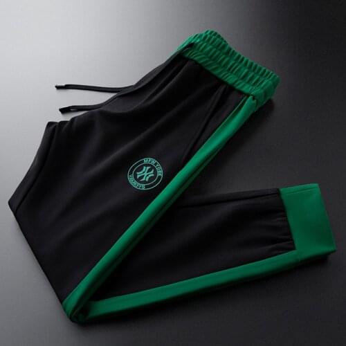 Autumn new white sports pants mens trendy brand tie-foot casual mens knitted pants trend all-match