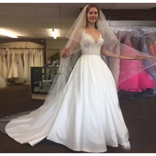 2020 Elegant A Line Wedding Dresses Illusion V Neck Appliques Sweep Train Bridal Gowns With Beaded Sash Custom Made