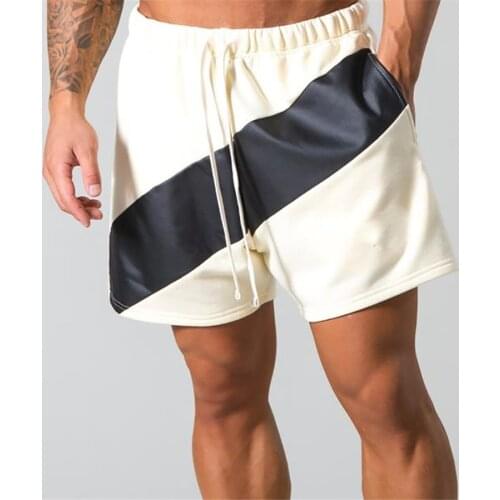 2021 Summer bodybuilding five-point pants mens gyms fitness exercise casual sports pants fashion trend elastic slim shorts