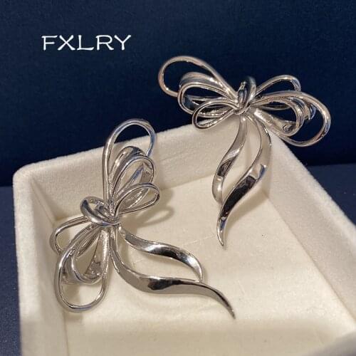 FXLRY High Quality Metallic Style Exaggerates The Personality Of The Big Bow Glossy Ribbon Knot Earrings For Women Jewelry