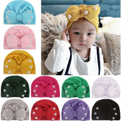 New 1PCS Warm Baby Hats Cute Boys Girls Bow Hats Knot Ear Bows with Pearl Bonnet Beanie Cap Infant Toddler Turban Headwear