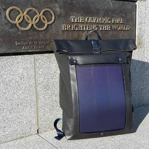 Customized portable backpack charger in olive brown 7 Watt water resistant solar panel Charge all Smartphones and portable USB