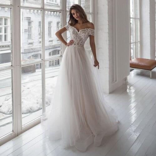 A-Line Off The Shoulder Tulle Wedding Dresses 2021 Sweetheart Lace Appliques Button Bridal Gown For Women Backless Sweep Train