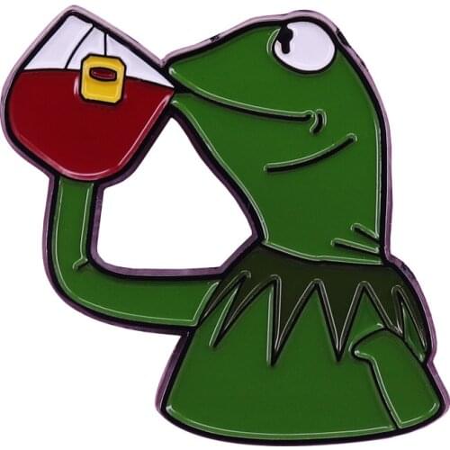 Kermit sipping tea pin inspired by the popular "Not My Business Kermit The Frog" meme jewelry