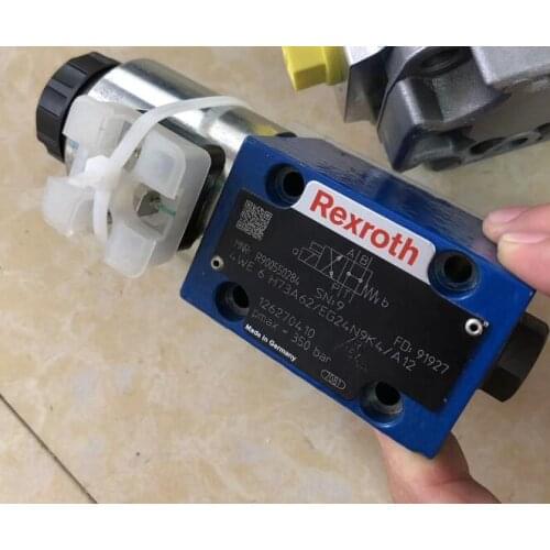 Rexroth Hydraulic solenoid valve MNR:R900550284 SN:9 FD:91927 4WE 6 H73A62/EG24N9K4/A12
