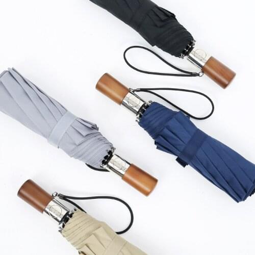Ten Bones Windproof Umbrella Tri-fold Fully Automatic Sunny Rain Folding Umbrella Male Business Solid Wood Handle Umbrella