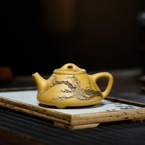 Yixing purple clay pot ore gold section mud plum blossom smelt stone scoop pot Kung Fu tea set 180cc