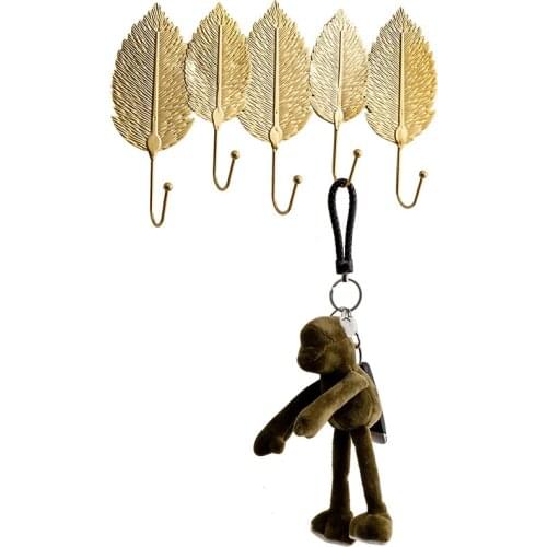 Modern light luxury clothing store dressing rooms bedroom door hanging hook personality golden leaves coat hook on the wall
