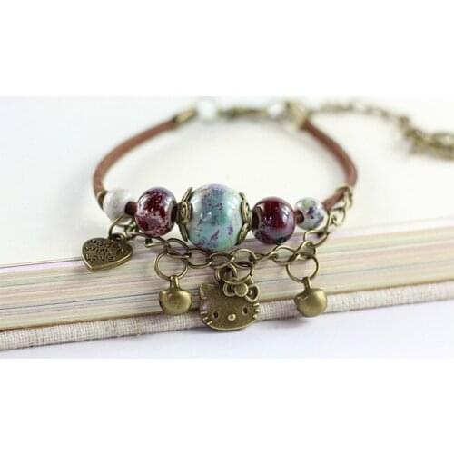 12 Pieces/Lot Leaf Charm Leather Bracelets Women Ceramic Beads Bells Link Chain Cuff Bangle Bohemian Ladies Jewelry Accessories