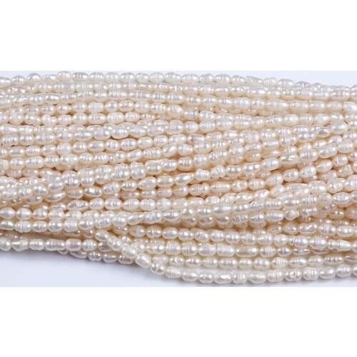Wholesale freshwater bulk freshwater beads rice shape strand pearl