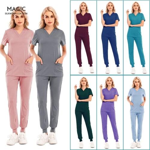 Wholesale Fashion Scrub Suits Hospital Uniform Set Solid Color Unisex Surgical Gown Pocket V-neck Scrubs Set for Women Joggers
