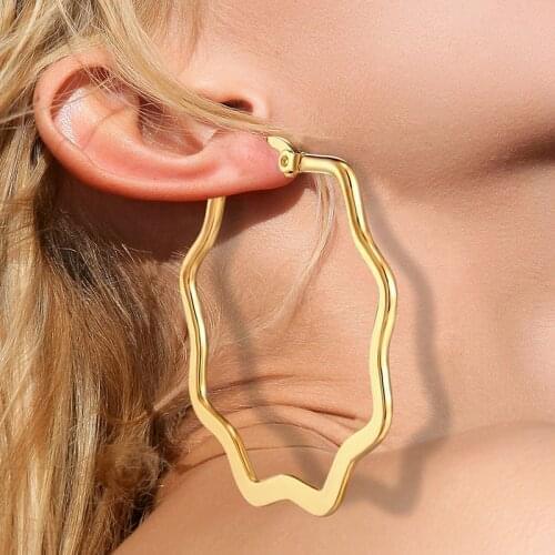 European and American earrings Stainless steel golden plum blossom geometric big ear hoop coil earrings woman‘s simple earrings