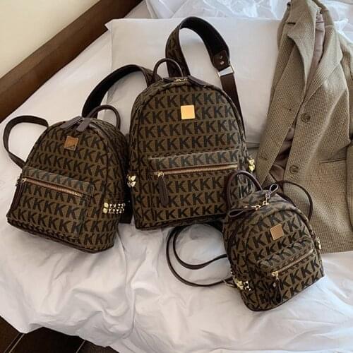 2011New European And American Style Solid Color Pu Backpack Women Fashion All-Match Outdoor Travel Size Big And Small Storag bag