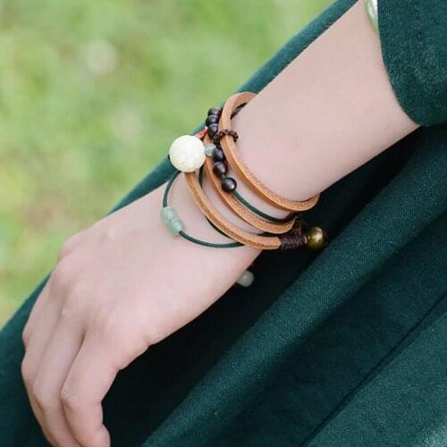 Fashion ethnic top layer of leather bracelet,multi layers bells vintage bracelet,carved bodhi lotus ethnic charm bracelet