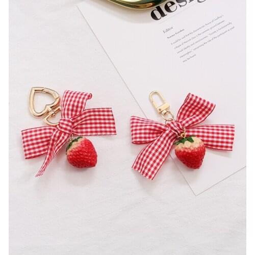 2021 Cute 3D Strawberry Sweet Fabric bowknot Gold Metal Pompom Car Keychain Key Chain Charm Pendant AirPods Accessories D651
