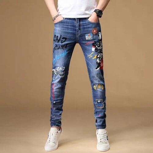 Free Shipping New 2020 mens male American jeans Spring trend personalized pants printed slim elastic hole embroidery trousers