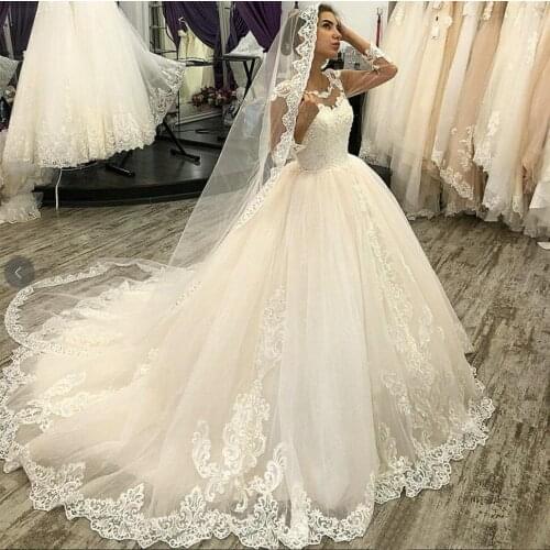 Luscious Boho O Neck Wedding Gowns Long Sleeves Illusion Lace Applique Wedding Dress Ball Gown Tulle Court Train Bridal Dresses