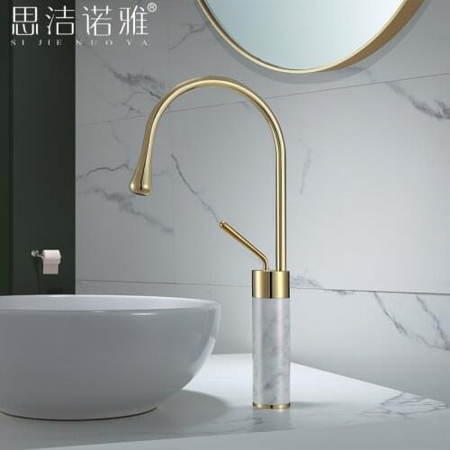 All copper natural marble golden hot and cold faucet drawing gold platform basin heightening rotation creativity