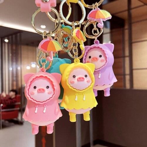 Soft rubber cute raincoat cartoon piggy doll couple keychain creative small gift mobile phone backpack car pendant fun keychain