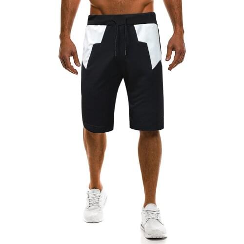 Hot mens casual pants Personality spell leather tide mens fashion casual shorts