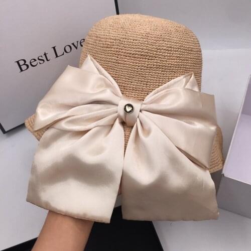 Summer new lafite straw hat folding bow fisherman hat Hepburn elegant small sweet wind small pure and fresh sunhat bucket hats