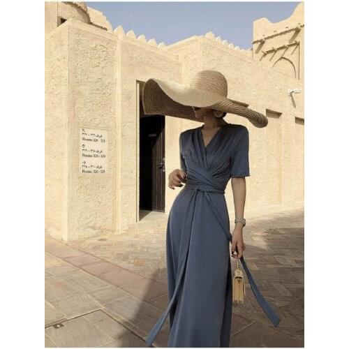 Womens summer French retro V-neck Hepburn style knee length dress . Temperament lace up dress