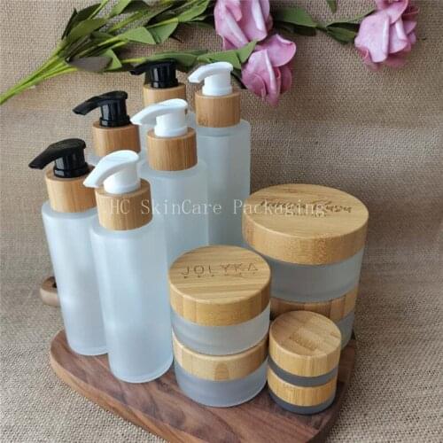 2020 Hot Sale Matte Glass Empty Bottles and Jars 100/120/150ml Bamboo Cap Lotion Pump Bottles Bulk Cosmetic Container