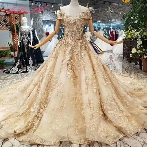 AnXin SH Luxury princess champagne flower lace beading crystal illusion boat neck sparkly wedding dress 100% real photo