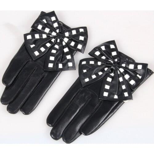 Spring and autumn womens fashion big Bow gloves female genuine sheepskin leather gloves white dot suede motorcycle gloves