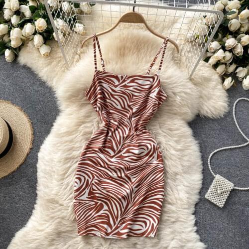 2021 summer new dress female design sense of scheming hollow halter strap slim-fit short zebra pattern suspender skirt