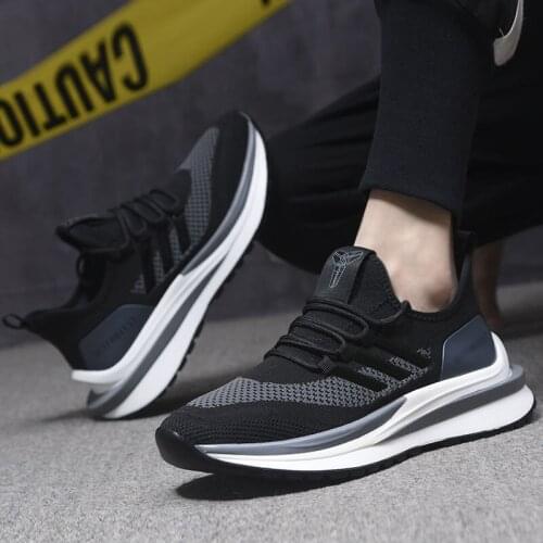 Spring mens shoes flying woven breathable mens sports shoes trend casual running shoes new mens shoes sneakers