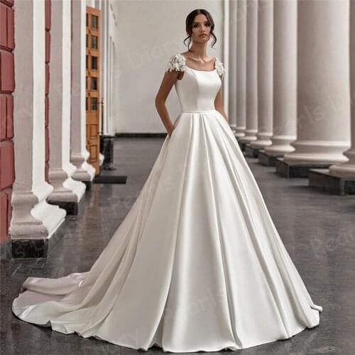 Gorgeous Satin Wedding Dress Cap Sleeve Scoop Neck Flowers A Line Bridal Gowns Pockets Robe De Mariee Sweep Train Bride Dress