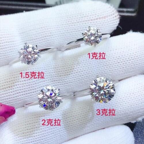 Real 18K gold ring. The real moissanite has white color and high hardness. The most popular classic style diamond ring for w