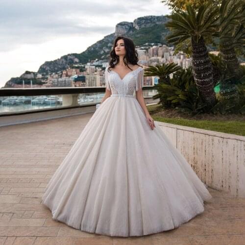 Sheer Open V-neck jewelry Beading Ball Gowns Sequin Wedding Dress Champagne Tulle Bridal Dress robe de mariee princesse de luxe
