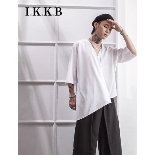 Medium length slash irregular vertical stripe black white short sleeve shirt personality shirt loose and coo