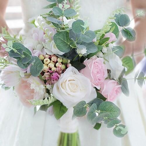 Iffo European French country wedding wedding bride holding flowers pink rose lily blue eucalyptus bouquet