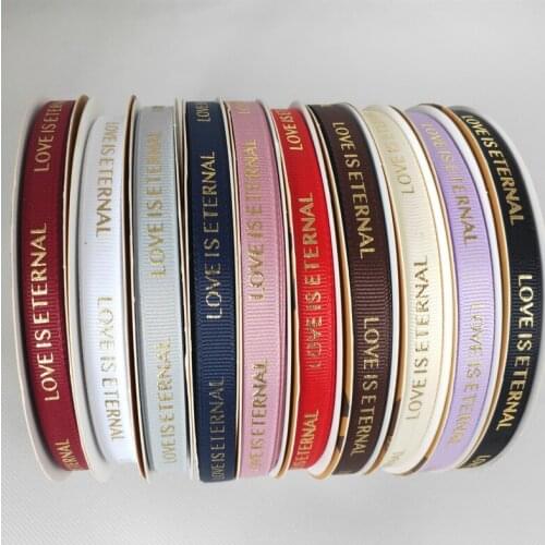 New10mm 50yards 10styles Printed LOVE IS ETERNAL Hot Stamping Ribbons DIY Handmade Tape Gift box decoration Clothing accessories