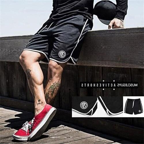 Mens summer fashion trend gym running sports shorts outdoor beach surfing rock climbing volleyball printed leisure shorts