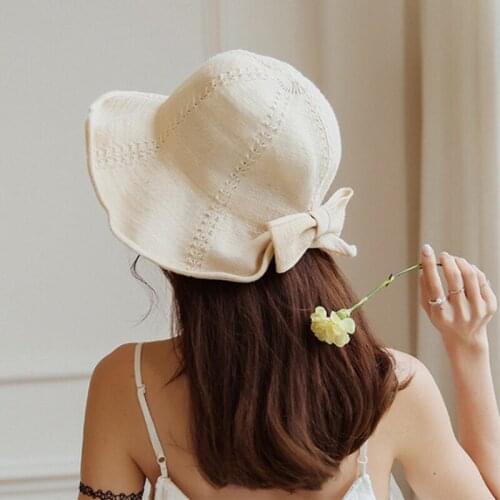 Mingjiebihuo Spring and Autumn thin section travel leisure basin cap Korean version of the bow knit sun protection sun hat girls